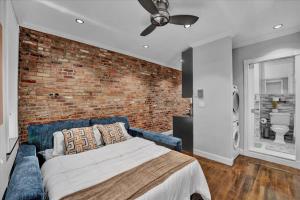 Postel nebo postele na pokoji v ubytování Stylish 3BR-2BA in Gramercy