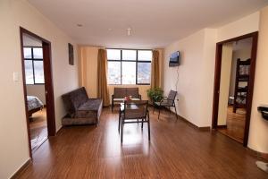 Ruang duduk di Apartamento familiar en Ambato