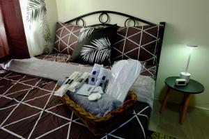 Postel nebo postele na pokoji v ubytování Cecils Cubao Cozy Escape