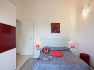 Ένα ή περισσότερα κρεβάτια σε δωμάτιο στο Sunny Stay in Tavullia Hills