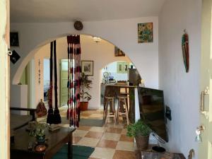 a living room with an archway in a house at Panoramic Luxury 2BR Beach Access in Dahab