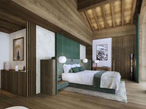 Ένα ή περισσότερα κρεβάτια σε δωμάτιο στο Penthouse luxe à Courchevel avec retour à ski et espace bien-être - FR-1-830-7