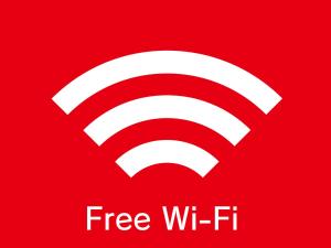 a red symbol with the words free wi fi at HOTEL WiLL EX 大高 レジャーホテル in Nagoya