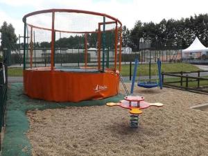 a playground with a play equipment in a park at Chalet 50m², 8 personnes, Terrasse - API-1-52-723 in Les Grandes-Ventes