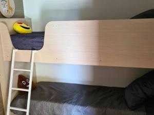 Ένα ή περισσότερα κρεβάτια σε δωμάτιο στο Mobil home PMR avec terrasse, 2 chambres pour 3 pers. - API-1-52-548 +14 φωτογραφίες