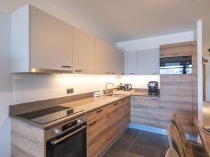 Kuchyň nebo kuchyňský kout v ubytování L'Alpe d'Huez - 10 pers, Wifi, Animaux admis - FR-1-645-91 + 8 fotografií