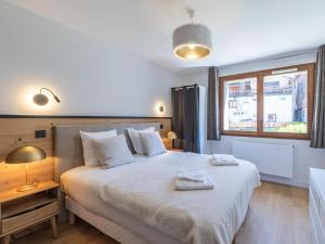 Postel nebo postele na pokoji v ubytování L'Alpe d'Huez - 10 pers, Wifi, Animaux admis - FR-1-645-91