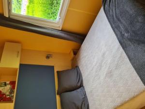 Χώρος καθιστικού στο Mobil-home avec Terrasse - 2 Chambres, 6 Personnes - API-1-52-514 +14 φωτογραφίες