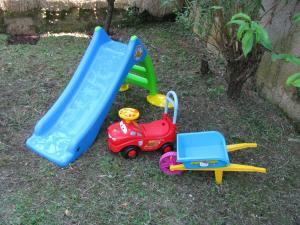 a group of toys sitting on the grass at Apartment Sea Garden in Ičići