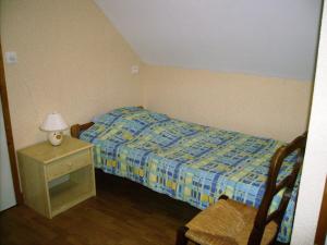 En eller flere senge i et værelse på La guguenaie
