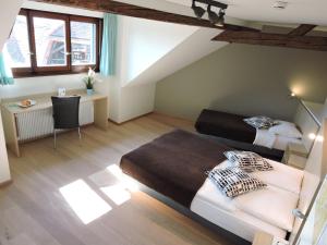 Postel nebo postele na pokoji v ubytování Auberge Communale de St-Légier
