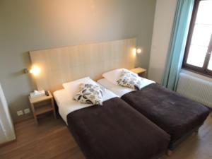 Postel nebo postele na pokoji v ubytování Auberge Communale de St-Légier + 15 fotografií