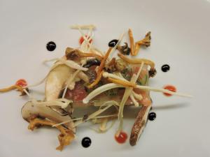 a pile of food on a white plate at Auberge Communale de St-Légier in Vevey