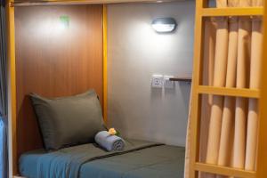 a bunk bed in a room with a ladder at Pondok Tis Bisma in Ubud +76 photos