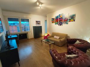 TV a/nebo společenská místnost v ubytování Nino Bixio TREVISO WIFI