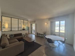 a living room with a couch and a table at DomusPlevano in Nocera Inferiore