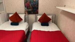 Ένα ή περισσότερα κρεβάτια σε δωμάτιο στο mater dei suite near royal liverpool hospital