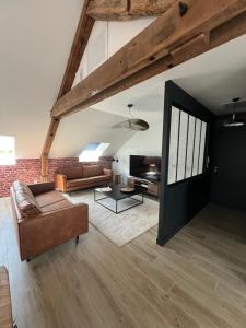 Χώρος καθιστικού στο Le loft du Moulin Lèves-Chartres