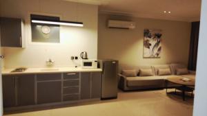 Χώρος καθιστικού στο شقق الورود الاربعة المخدومة +62 φωτογραφίες