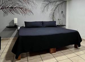 Ένα ή περισσότερα κρεβάτια σε δωμάτιο στο La Puerta Blanca #3