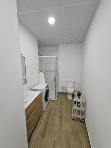 Ένα μπάνιο στο Triana Suite Apartament