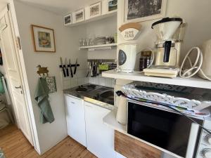 Kuchyň nebo kuchyňský kout v ubytování Lyckorna 62:1 + 17 fotografií