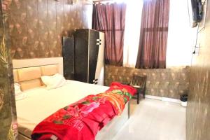 Giường trong phòng chung tại Hotel O The Sukoon