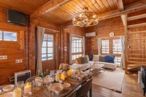 a living room with a table and a couch at green bell in Myoko