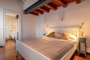 Ένα ή περισσότερα κρεβάτια σε δωμάτιο στο San Vito Sweet Home