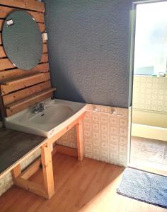 a bathroom with a sink and a mirror at 伊豆 白浜 ゲストハウス茉心 in Shimoda +37 photos