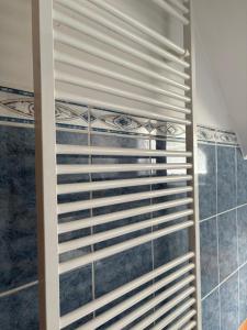 a bathroom with a shower with blinds at Apartmány U Dvořáků in Janske Lazne +36 photos