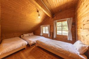 Una cama o camas en una habitación de Relax River