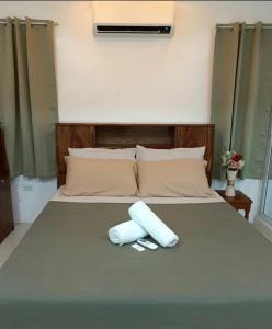 Ένα ή περισσότερα κρεβάτια σε δωμάτιο στο Panikseafarm Couple Room in a Homestay at San Juan La Union - Panikseafarm