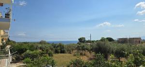 a view of the ocean from a house at SOLUNTUM - locazione turistica in Santa Flavia