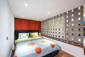 Una cama o camas en una habitación de Xizhi B&B & Luxury Courtyard