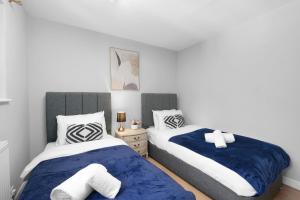 Postel nebo postele na pokoji v ubytování Keel Drive Modern 3-Bedroom, 2-Bathroom Home