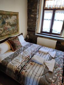 Ένα ή περισσότερα κρεβάτια σε δωμάτιο στο Villa Erotokritos