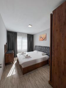 Katil atau katil-katil dalam bilik di Roes Appartment 3