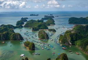 an aerial view of a group of boats in a bay at GOLDEN JOY HOTEL & APARTMENT in Hai Phong