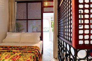 a bedroom with a bed in a room at Kasbah Dream - Great Location in Tangier in Tangier