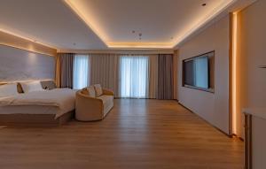 Φωτογραφία από το άλμπουμ του CHENG SHUANG PHOENIX HOTEl凤凰成双酒店 σε Kon Rung (1)