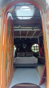 a bedroom with a bed in the middle of a room at El Domo Macanal in Macanal +22 photos