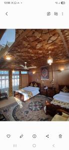 Кровать или кровати в номере Young Beauty Star Houseboat