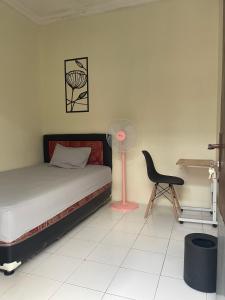 Postel nebo postele na pokoji v ubytování Zahra Guesthouse Shar'i + 39 fotografií