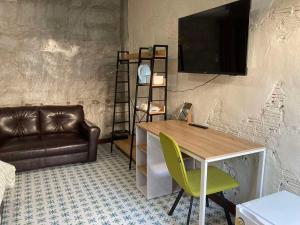 TV a/nebo společenská místnost v ubytování Le Park 23 Boutique Resort