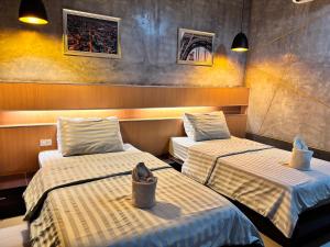 Postel nebo postele na pokoji v ubytování Le Park 23 Boutique Resort