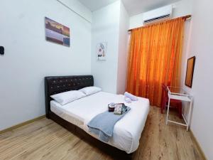 Krevet ili kreveti u jedinici u okviru objekta Segambut KL Taman Prima Impian W Fully Air-Con 51200 KL