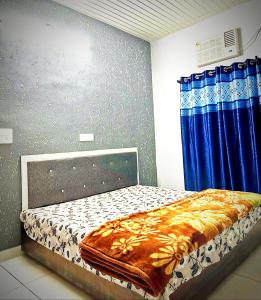 En eller flere senge i et værelse på SUN VIEW Homestay + 2 billeder