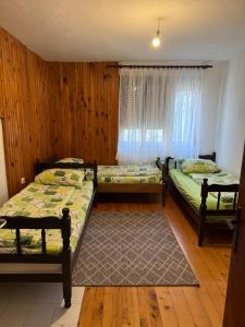 Un ou plusieurs lits dans un hébergement de l'établissement Apartman Marjana