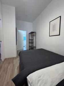 Ένα ή περισσότερα κρεβάτια σε δωμάτιο στο Habitación privada con baño en suite I